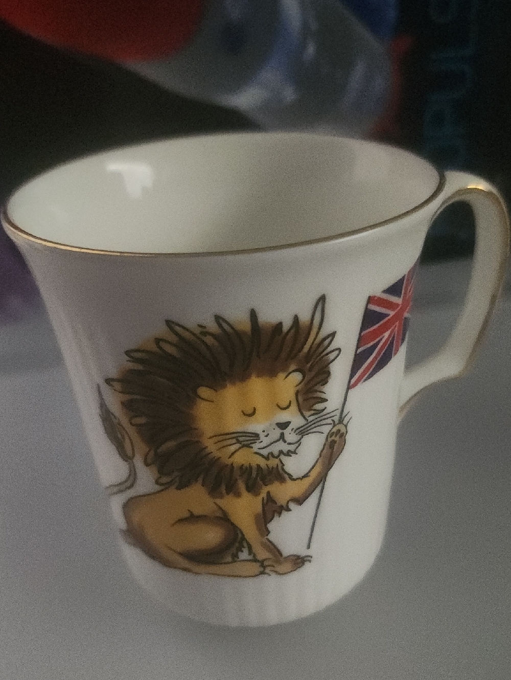 Royal Albert White and Gold Porcelain Mug with Lion Motif